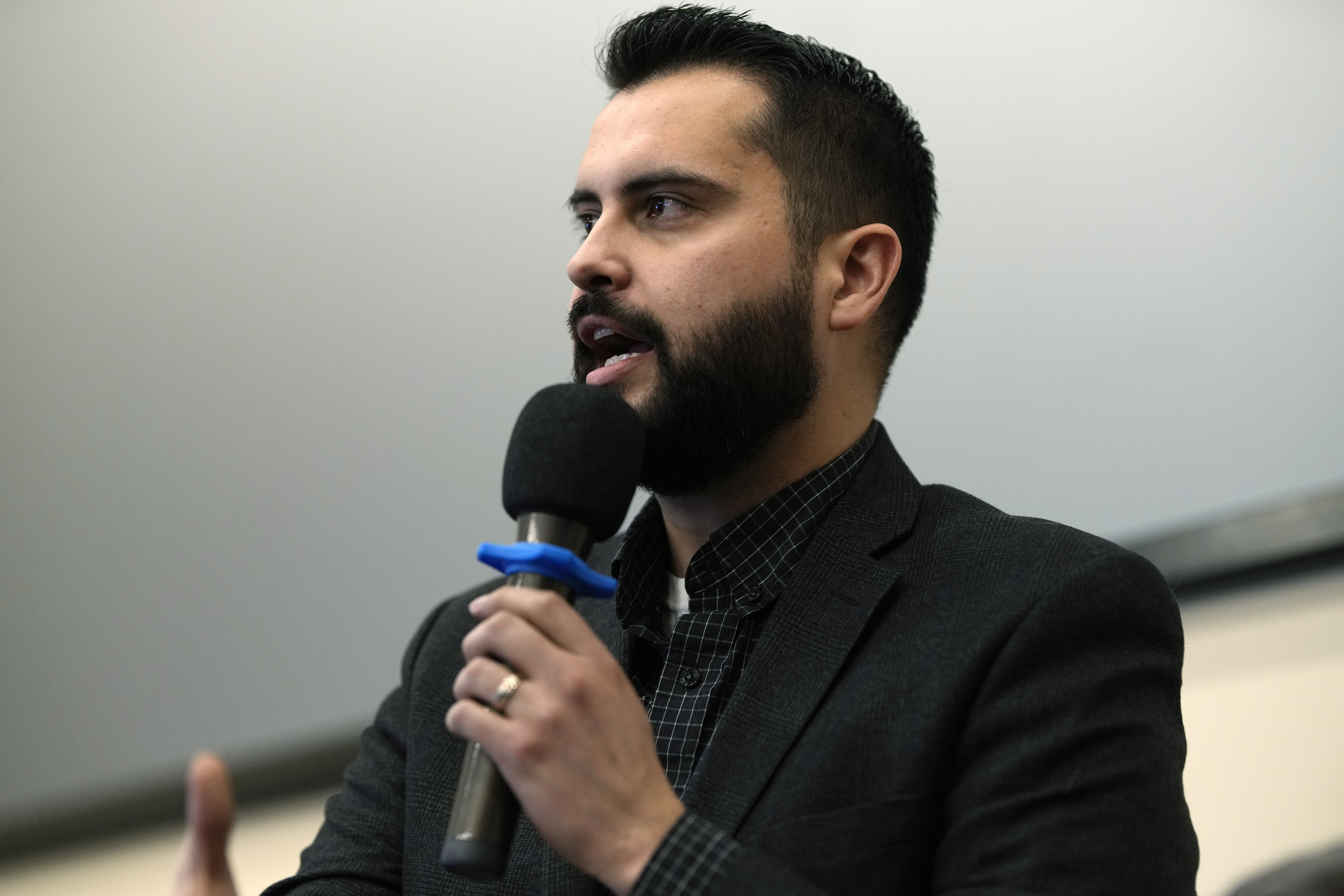 Dave Williams speaks during a debate