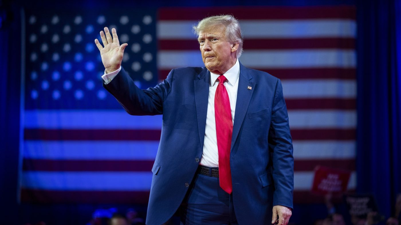 Former President Donald Trump waves as he departs after speaking at the Conservative Political Action Conference