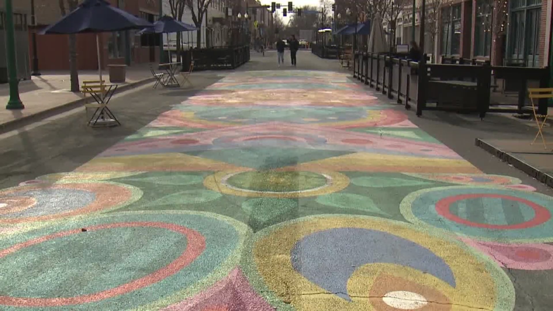 Colorado swirls are painted on a walkable town street