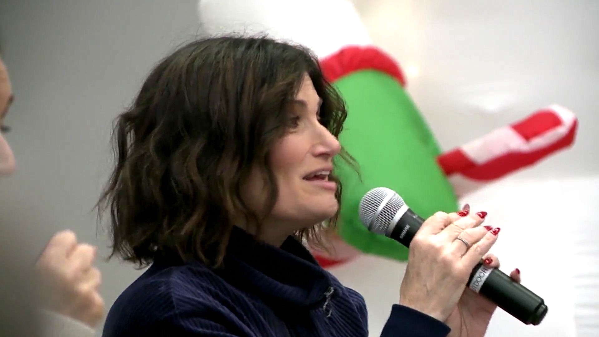 Idina Menzel, noted actress and voice of Elsa in the movie Frozen, came to a school in Erie to debut her new children's book.