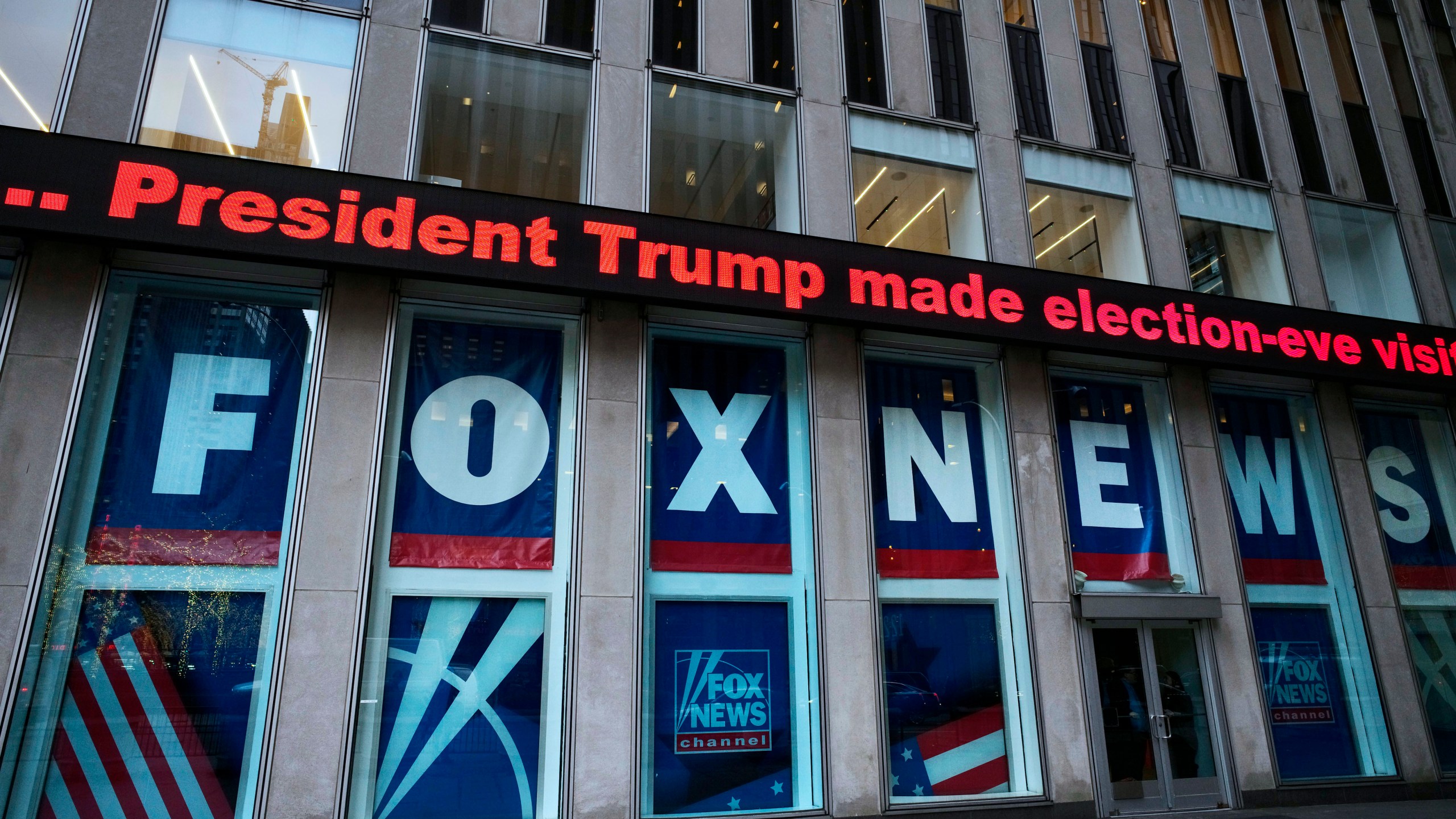 A headline about President Donald Trump is displayed outside Fox News studios in New York