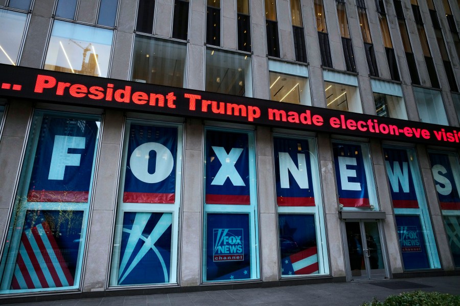 A headline about President Donald Trump is displayed outside Fox News studios in New York