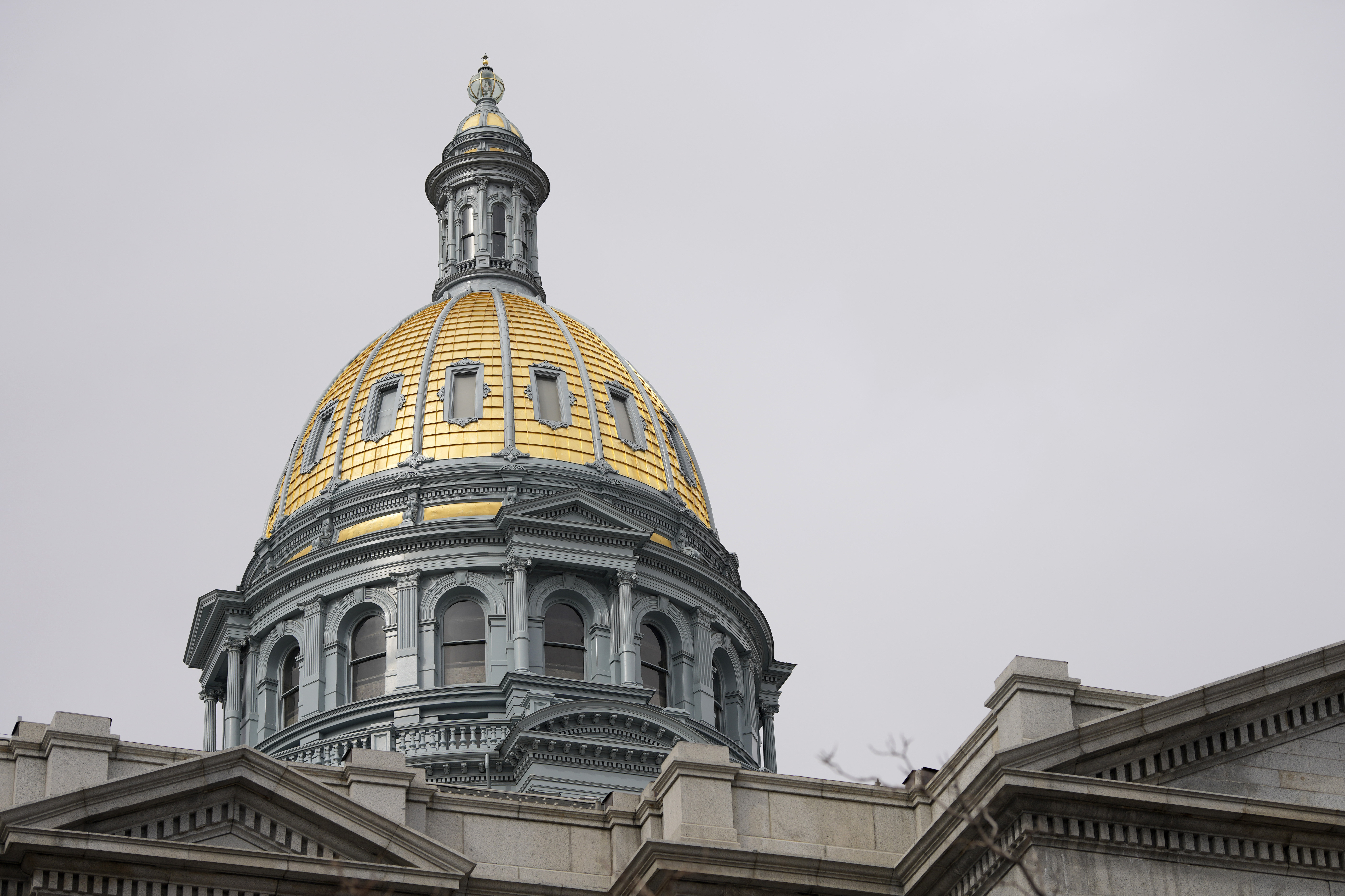 The gold dome of the Colorado State Capitol on March 23, 2023, in Denver. In Colorado