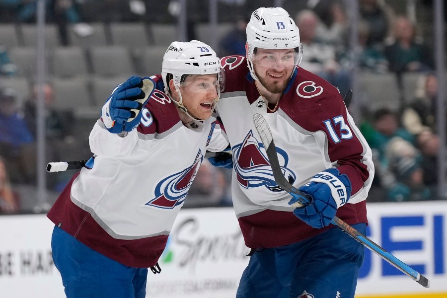 Colorado Avalanche center Nathan MacKinnon (29) celebrates with Valeri Nichushkin (13)