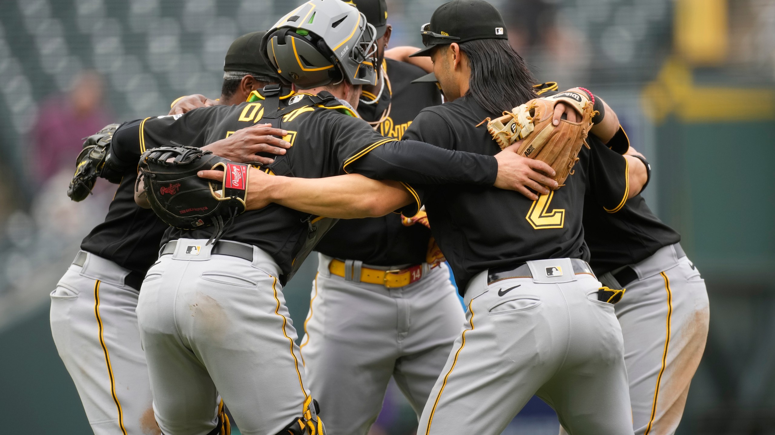 Pittsburgh Pirates celebrate in a huddle