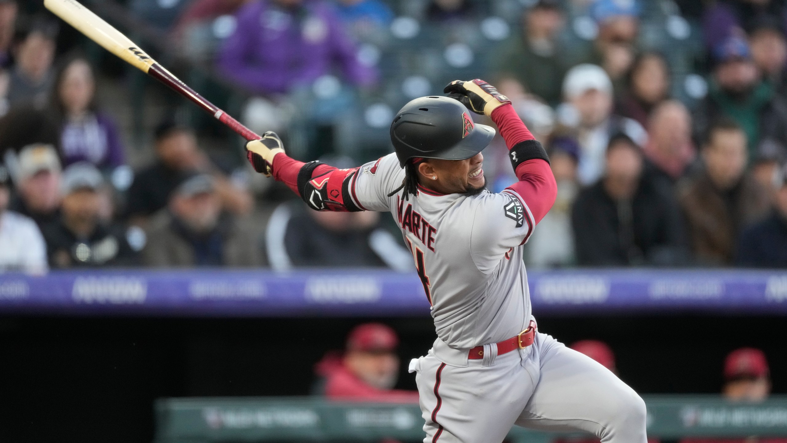 Arizona Diamondbacks' Ketel Marte watches his solo home run off Colorado Rockies starting pitcher Kyle Freeland