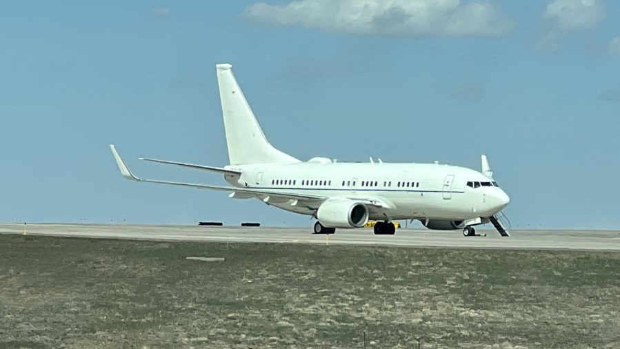 Executive One Foxtrot, the plane that carries the first family, is parked at Denver International Airport after flight issues forced it prevented a scheduled trip to Michigan