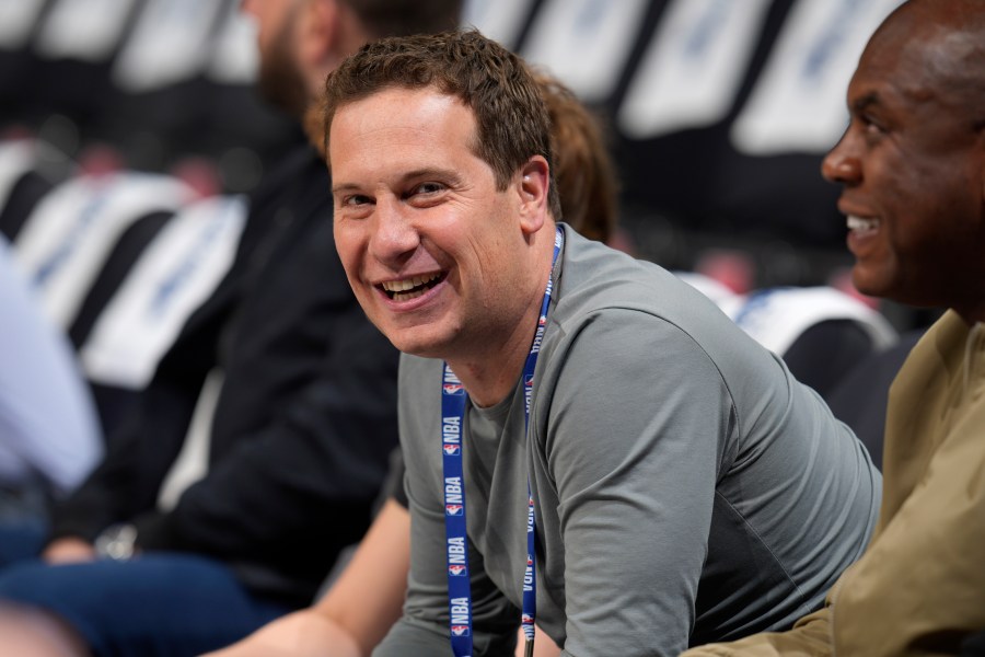 Phoenix Suns owner Mat Ishbia looks on as players warm up before Game 5 of an NBA basketball second-round playoff series against the Denver Nuggets Tuesday, May 9, 2023, in Denver. (AP Photo/David Zalubowski)