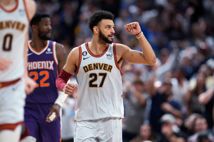 Denver Nuggets guard Jamal Murray gestures after hitting a 3-point basket against the Phoenix Suns during the second half of Game 5 of an NBA Western Conference basketball semifinal playoff series Tuesday, May 9, 2023, in Denver. (AP Photo/David Zalubowski)