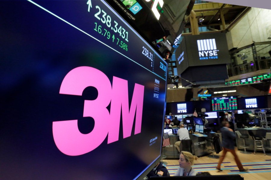 FILE - The logo for 3M appears on a screen above the trading floor of the New York Stock Exchange, Oct. 24, 2017. 3M has fired prominent company executive Michael Vale due to “inappropriate personal conduct and violation of company policy,” the maker of Post-it notes, industrial coatings and ceramics announced on Monday, May 15, 2023. (AP Photo/Richard Drew, File)