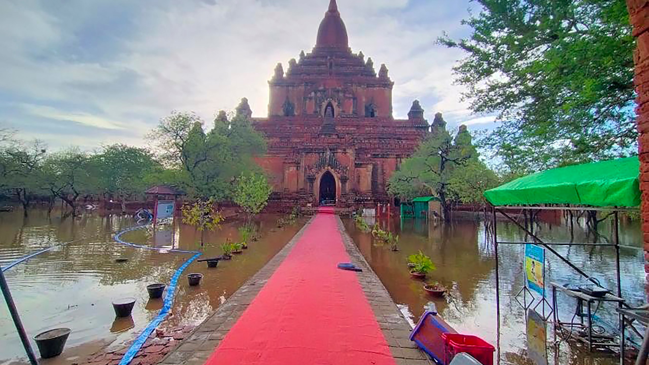 This photo provided by Myanmar Military True News Information Team on Monday, May 15, 2023, shows flooded areas caused by Cyclone Mocha near old temple in Bagan, Central Myanmar. Rescuers early Monday evacuated about 1,000 people trapped by seawater 3.6 meters (12 feet ) deep along western Myanmar's coast after the powerful cyclone injured hundreds and cut off communications. (Military True News Information Team via AP)