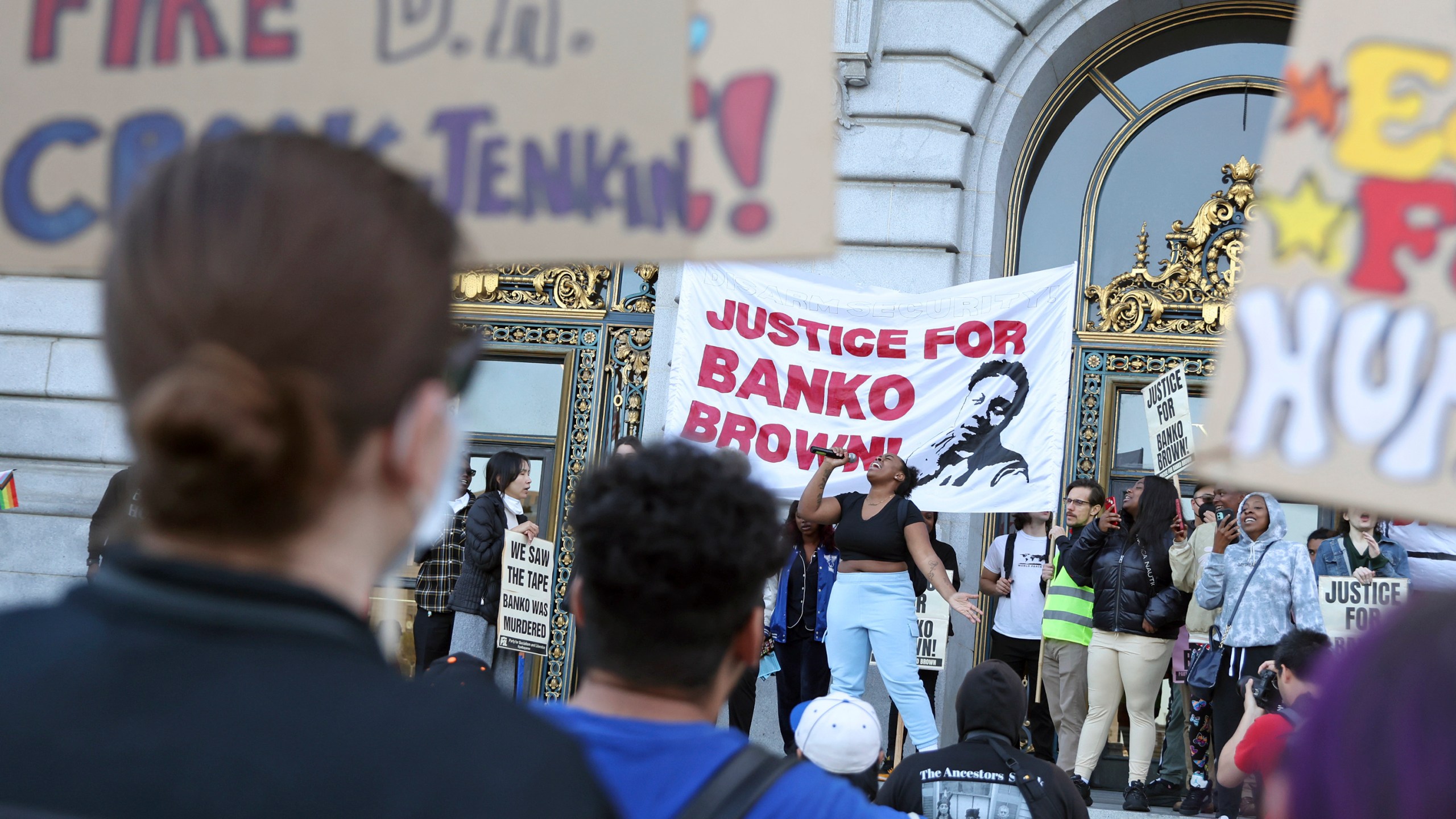 Asia Hubbard, ex-girlfriend of Banko Brown, speaks outside City Hall, Monday, May 15, 2023, after a march from the Market Street Walgreens in San Francisco, following District Attorney Brooke Jenkins' decision not to prosecute security guard, Michael Earl-Wayne Anthony, for confronting and killing Brown, who was suspected of shoplifting inside the store. (Scott Strazzante/San Francisco Chronicle via AP)