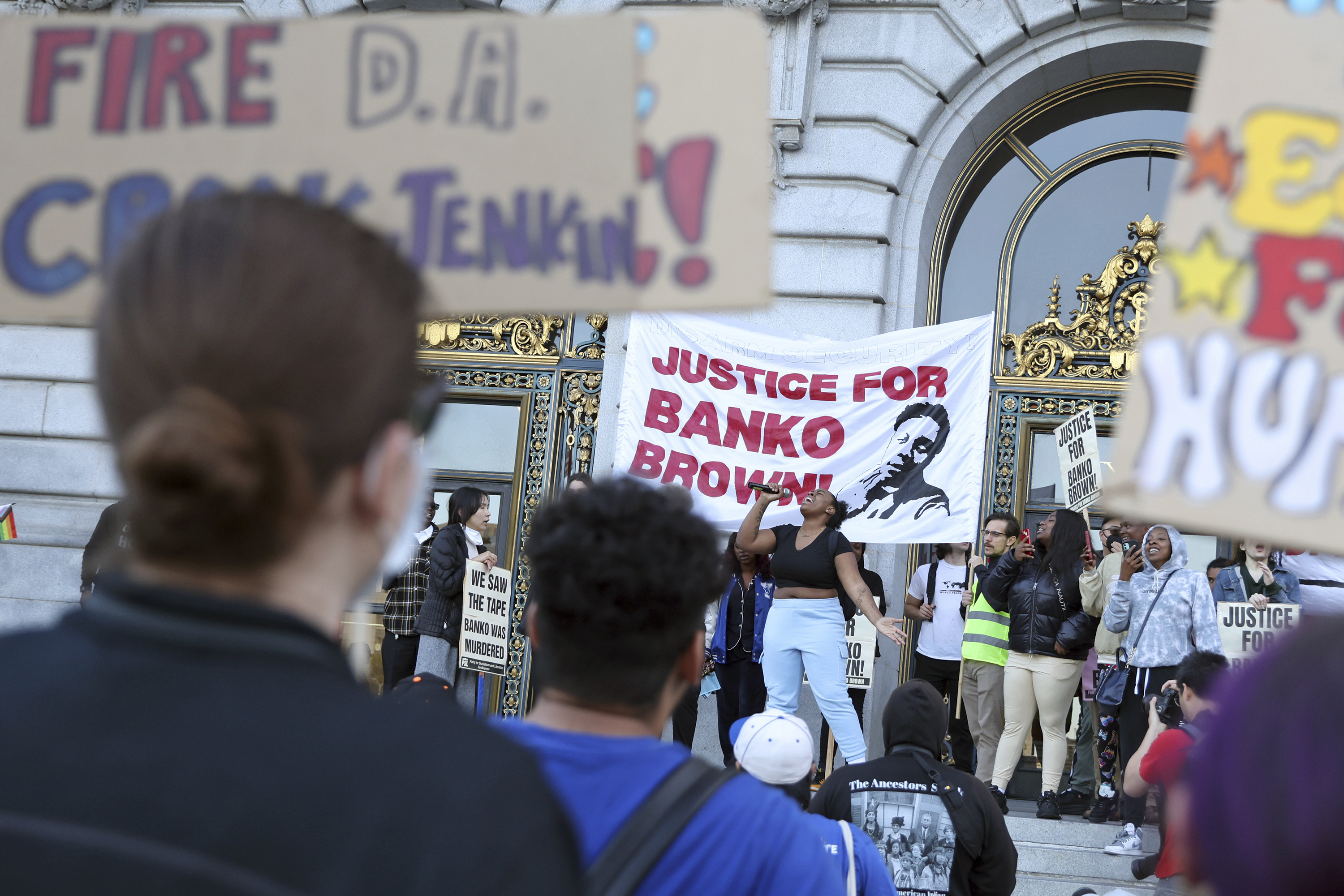 Asia Hubbard, ex-girlfriend of Banko Brown, speaks outside City Hall, Monday, May 15, 2023, after a march from the Market Street Walgreens in San Francisco, following District Attorney Brooke Jenkins' decision not to prosecute security guard, Michael Earl-Wayne Anthony, for confronting and killing Brown, who was suspected of shoplifting inside the store. (Scott Strazzante/San Francisco Chronicle via AP)