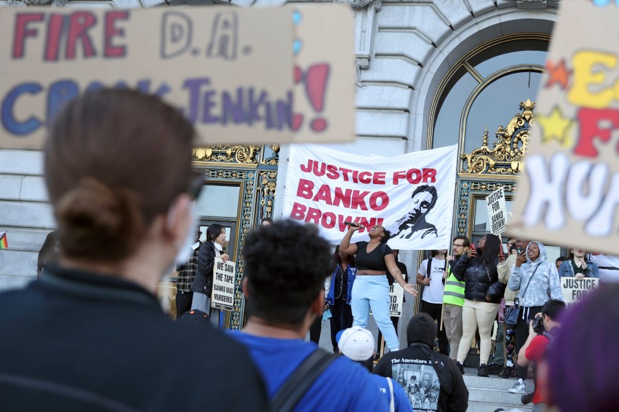 Asia Hubbard, ex-girlfriend of Banko Brown, speaks outside City Hall, Monday, May 15, 2023, after a march from the Market Street Walgreens in San Francisco, following District Attorney Brooke Jenkins' decision not to prosecute security guard, Michael Earl-Wayne Anthony, for confronting and killing Brown, who was suspected of shoplifting inside the store. (Scott Strazzante/San Francisco Chronicle via AP)