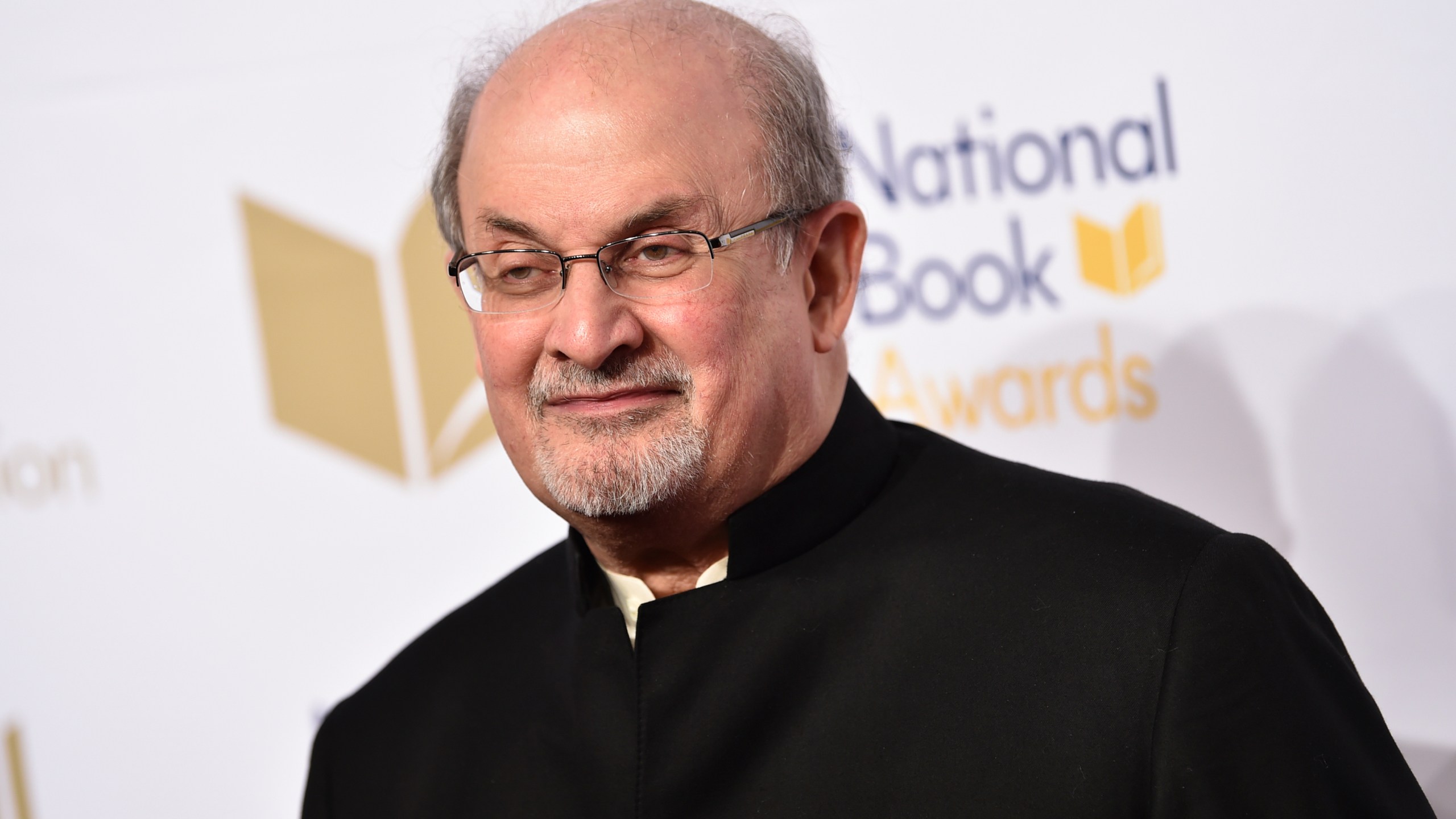 FILE - Salman Rushdie attends the 68th National Book Awards Ceremony and Benefit Dinner on Nov. 15, 2017, in New York. Writer Salman Rushdie has made a public speech nine months after being stabbed and seriously injured onstage, warning that freedom of expression in the West is under its most severe threat of his lifetime. Rushdie delivered a video message to the British Book Awards, where he was awarded the Freedom to Publish award on Monday evening May 15, 2023. (Photo by Evan Agostini/Invision/AP, File)