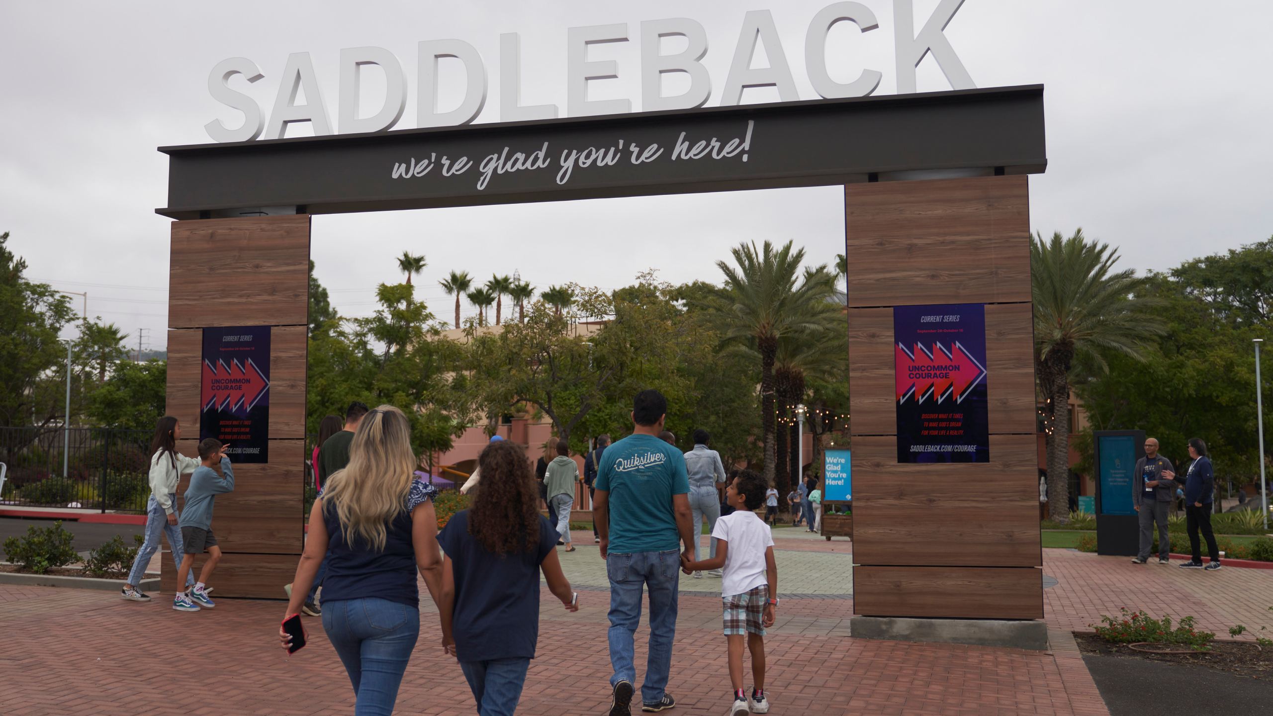 FILE - Congregants arrive at Saddleback Church in Lake Forest, Calif., on Sunday, Oct. 16, 2022. Saddleback Church is appealing its ouster from the Southern Baptist Convention for having women pastors on staff, according to the denomination. The Executive Committee of the nation’s largest Protestant denomination had voted to expel the church earlier this year. But the Southern California megachurch is exercising its right to appeal to the full annual meeting of the convention next month in New Orleans. Southern Baptists’ statement of faith says the office of pastor is limited to men. (AP Photo/Allison Dinner, File)