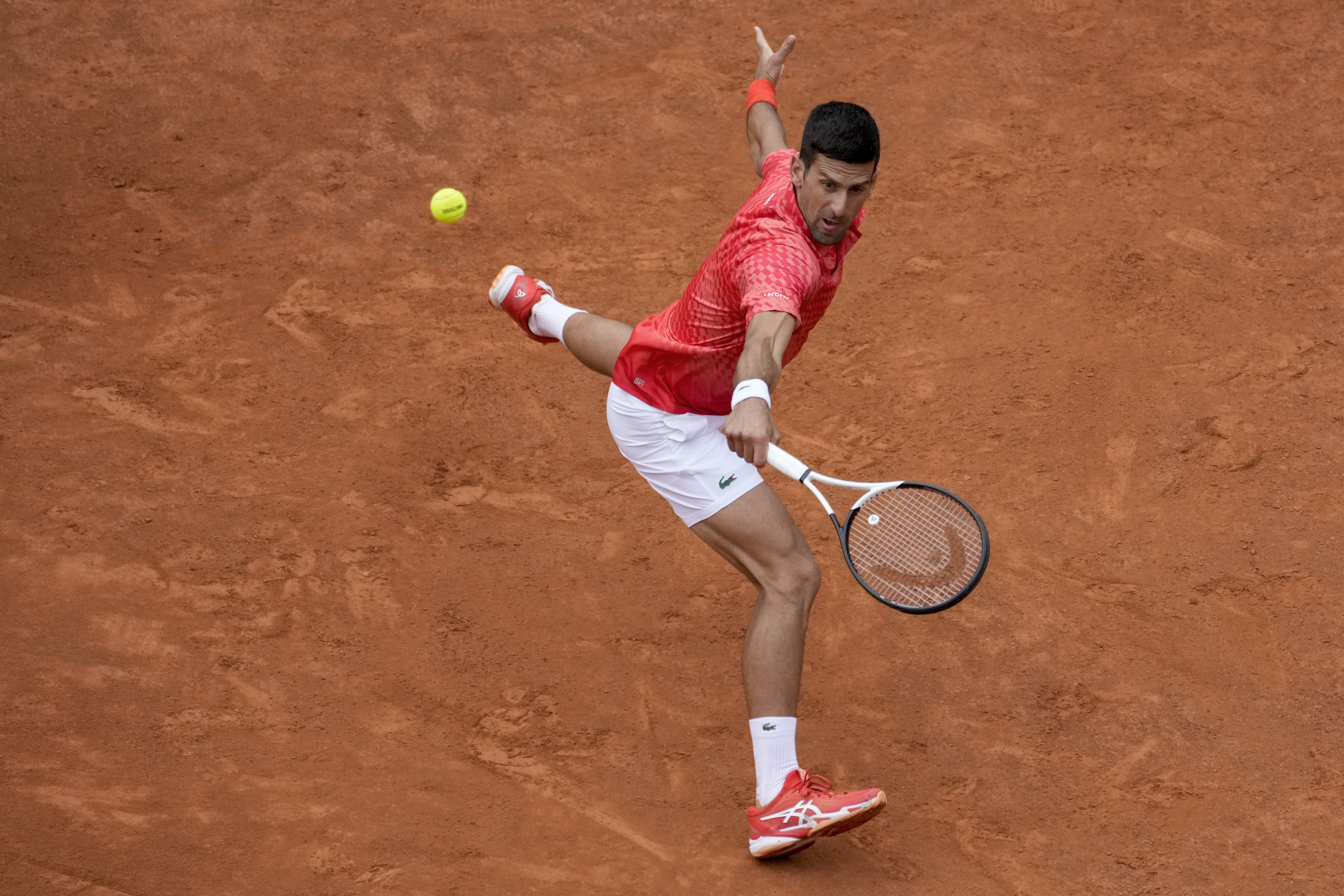 Novak Djokovic of Serbia returns the ball to Cameron Norrie of Britain at the Italian Open tennis tournament, in Rome, Tuesday, May 16, 2023. (AP Photo/Andrew Medichini)