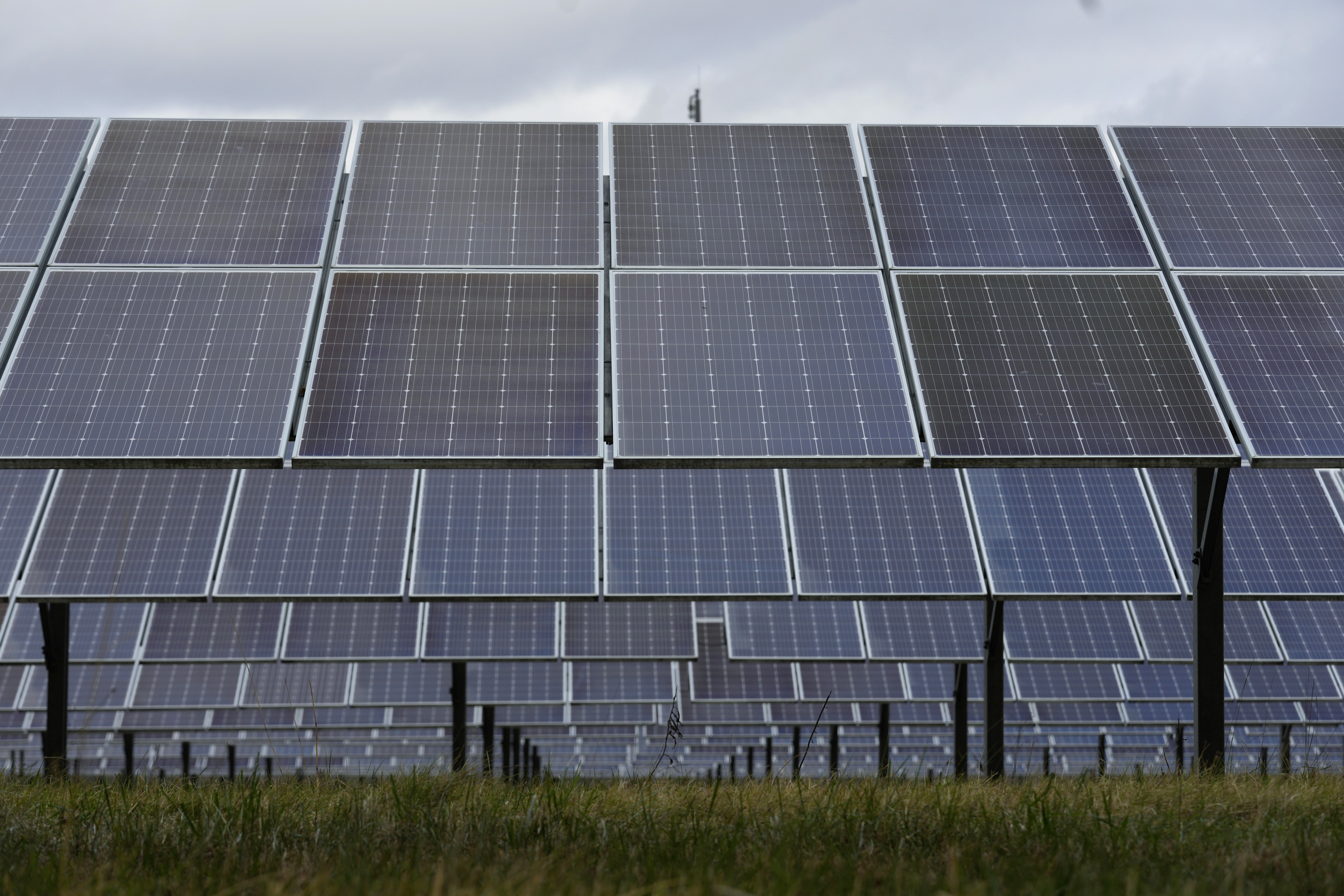 FILE - Solar panels work at the DTE O'Shea Solar Park in Detroit, Nov. 16, 2022. President Joe Biden vetoed on May 16, 2023, a congressional resolution that would have reinstated tariffs on solar panel imports from Southeast Asia, settling for now a long-running dispute over whether to punish China for trade violations that bypass U.S. rules limiting imports of cheap solar panels from Asia. (AP Photo/Paul Sancya, File)