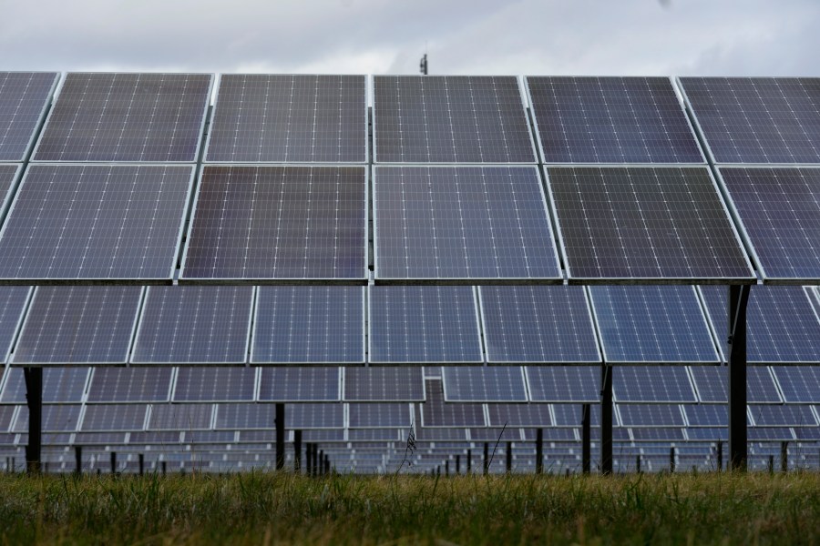 FILE - Solar panels work at the DTE O'Shea Solar Park in Detroit, Nov. 16, 2022. President Joe Biden vetoed on May 16, 2023, a congressional resolution that would have reinstated tariffs on solar panel imports from Southeast Asia, settling for now a long-running dispute over whether to punish China for trade violations that bypass U.S. rules limiting imports of cheap solar panels from Asia. (AP Photo/Paul Sancya, File)