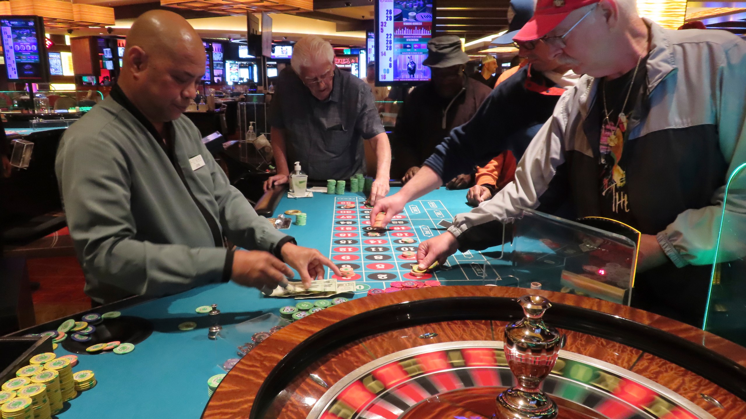 A dealer conducts a game of roulette at the Tropicana casino in Atlantic City, N.J., on May 12, 2022. New Jersey's casinos, racetracks that accept sports bets and their online partners won $462.7 million in April, an increase of 9.5% from a year earlier. That figure includes winnings from internet and sports betting operations. But the amount won on-premises by physical casinos fell by 1.6% to $231.4 million. (AP Photo/Wayne Parry)