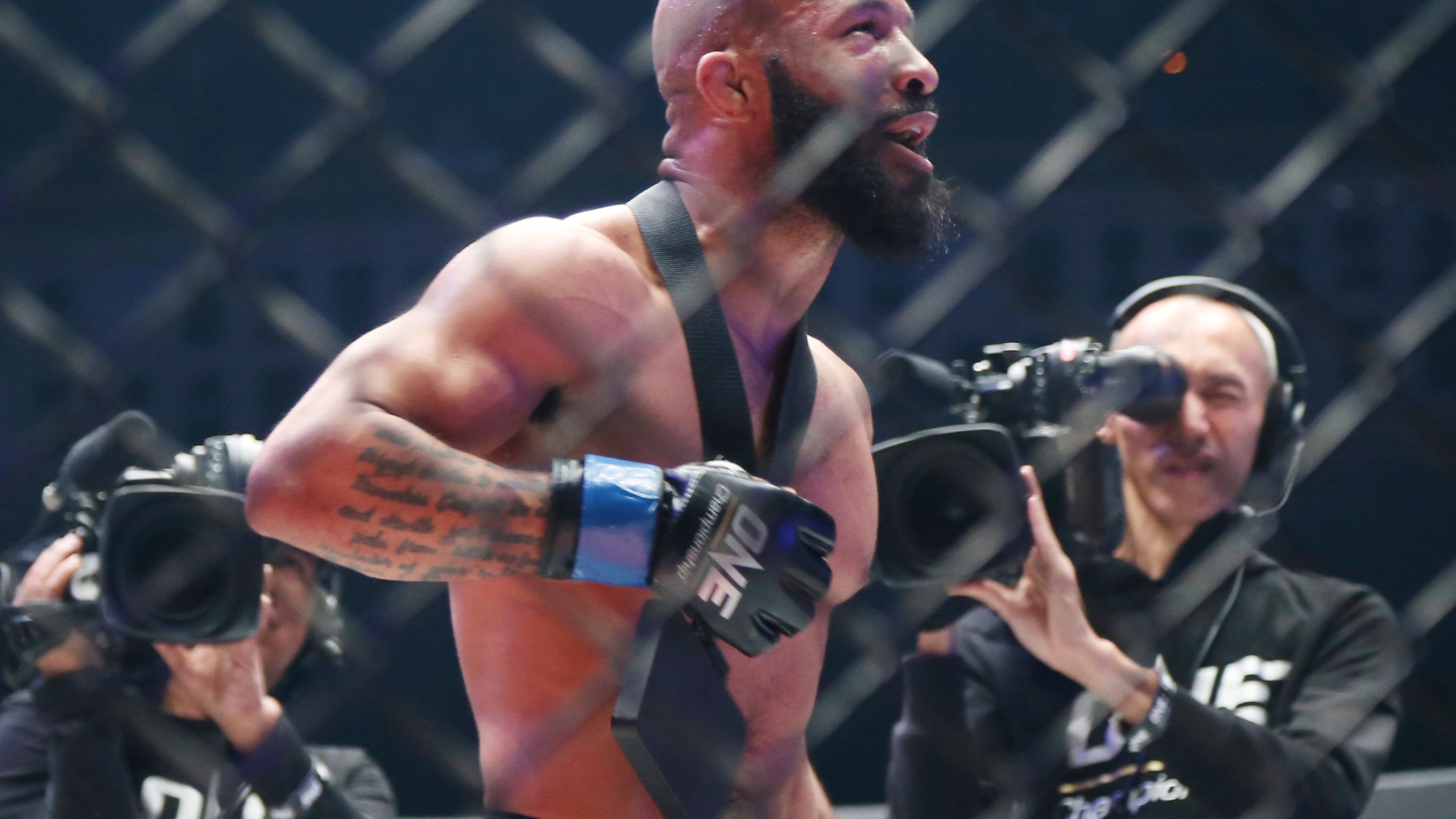 Mixed Martial Arts fighter Demetrious Johnson celebrates after defeating Japan's Yuya Wakamatsu in a flyweight world grand prix quarterfinal One Championship bout in Tokyo