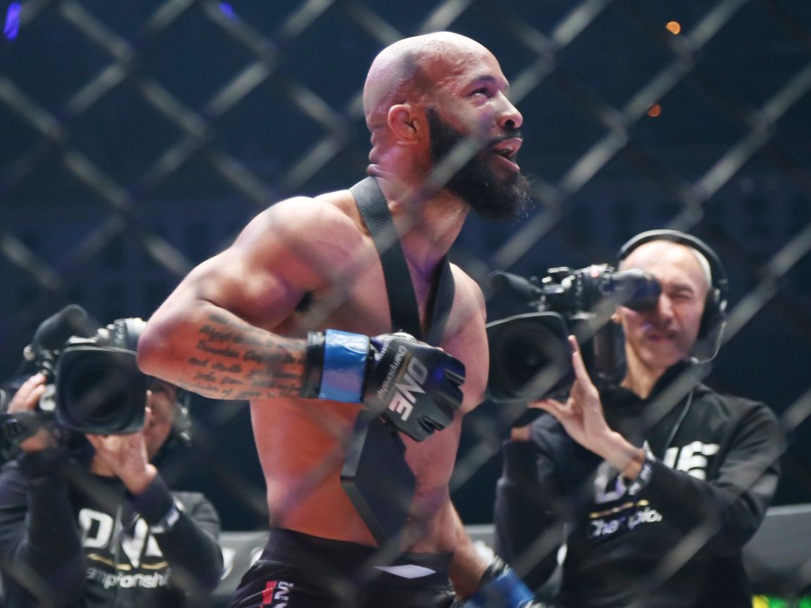 Mixed Martial Arts fighter Demetrious Johnson celebrates after defeating Japan's Yuya Wakamatsu in a flyweight world grand prix quarterfinal One Championship bout in Tokyo