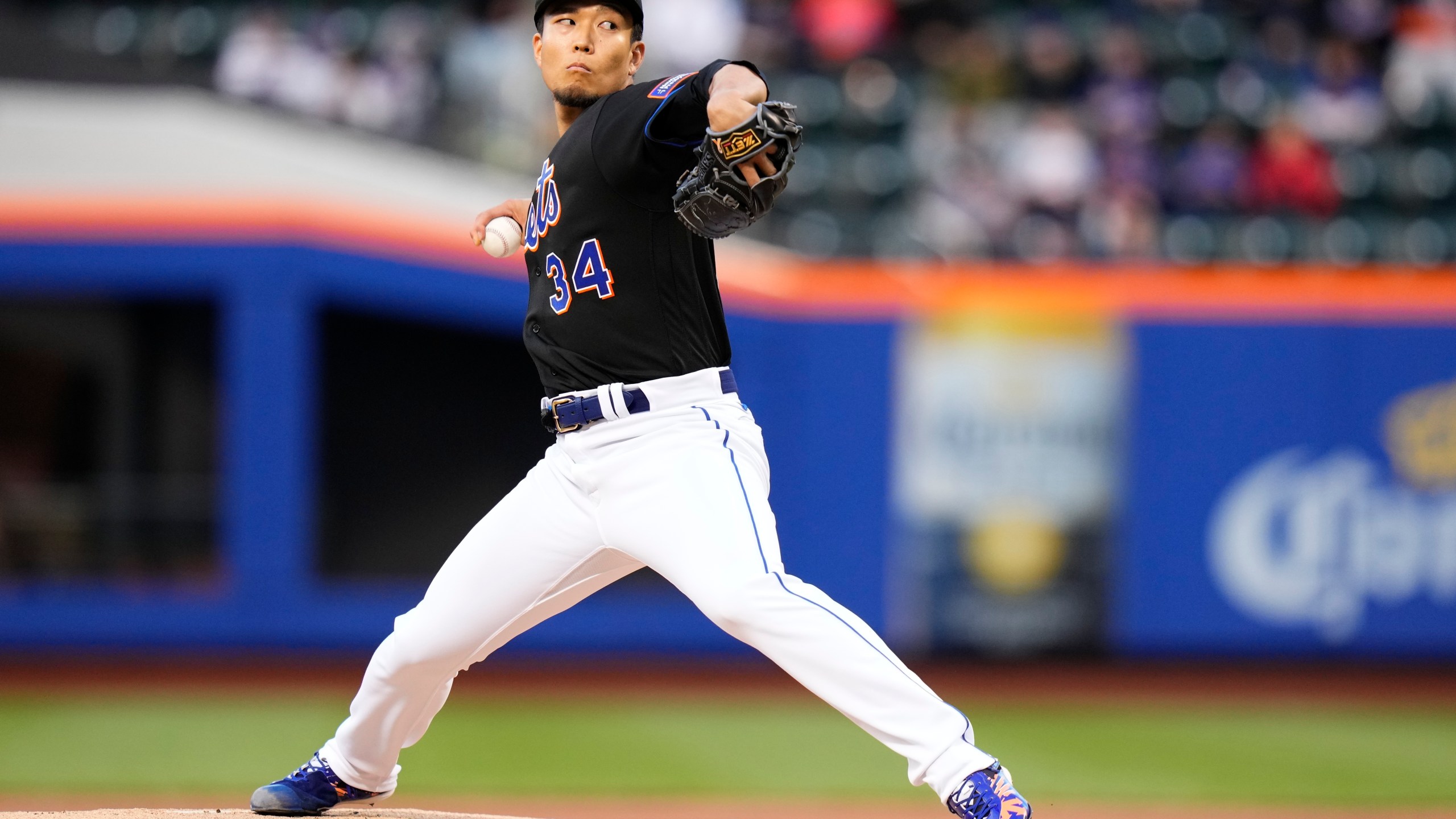 New York Mets' Kodai Senga, of Japan, pitches during the first inning of a baseball game against the Colorado Rockies