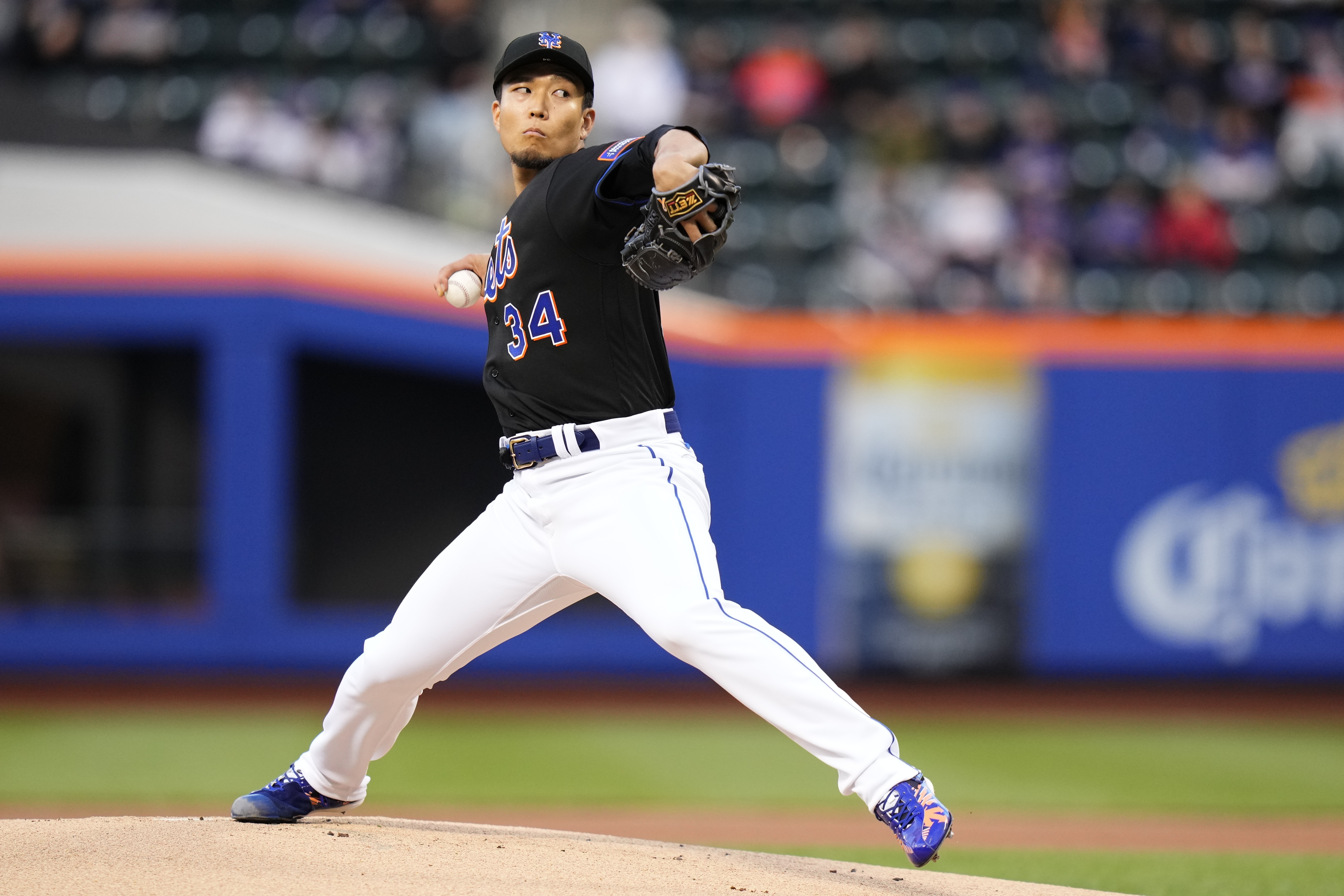 New York Mets' Kodai Senga, of Japan, pitches during the first inning of a baseball game against the Colorado Rockies