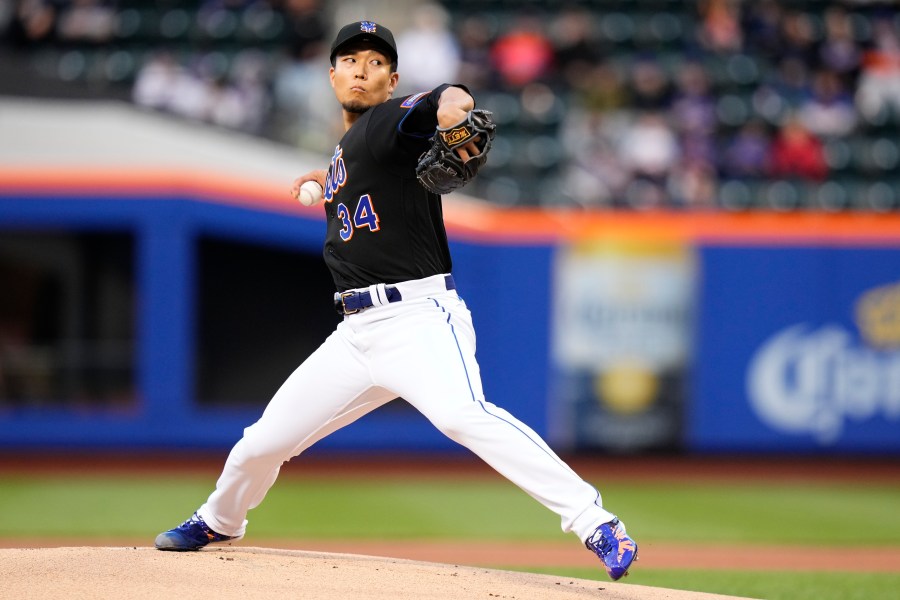 New York Mets' Kodai Senga, of Japan, pitches during the first inning of a baseball game against the Colorado Rockies