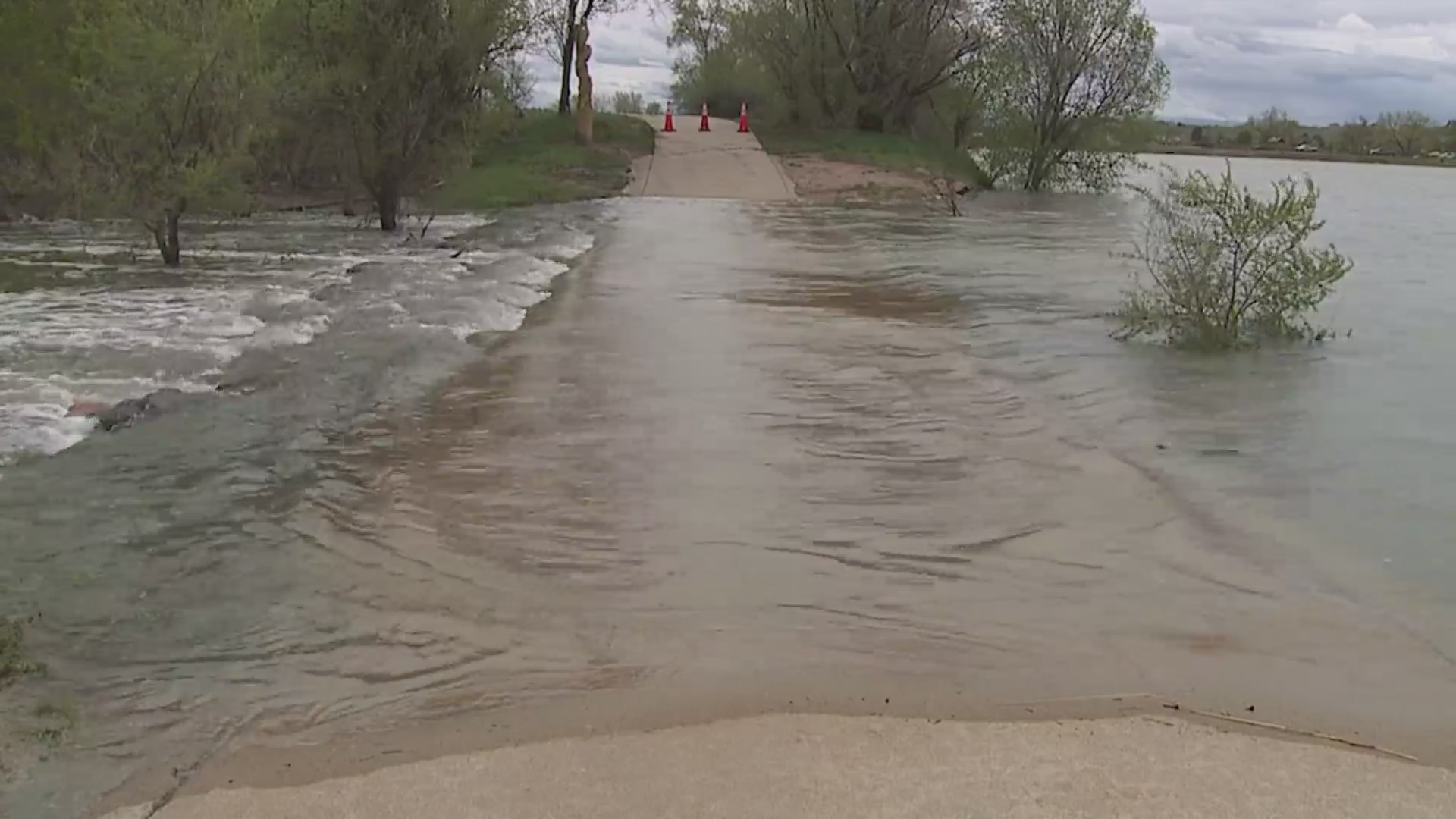 A road is covered by floodwater