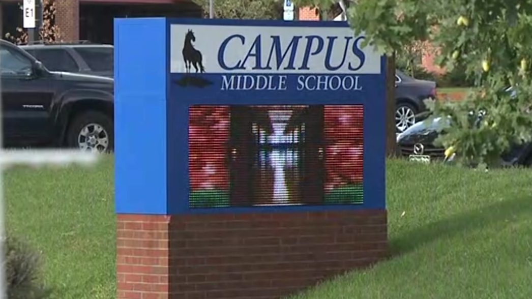 A sign outside Campus Middle School in Greenwood Village, Colo.