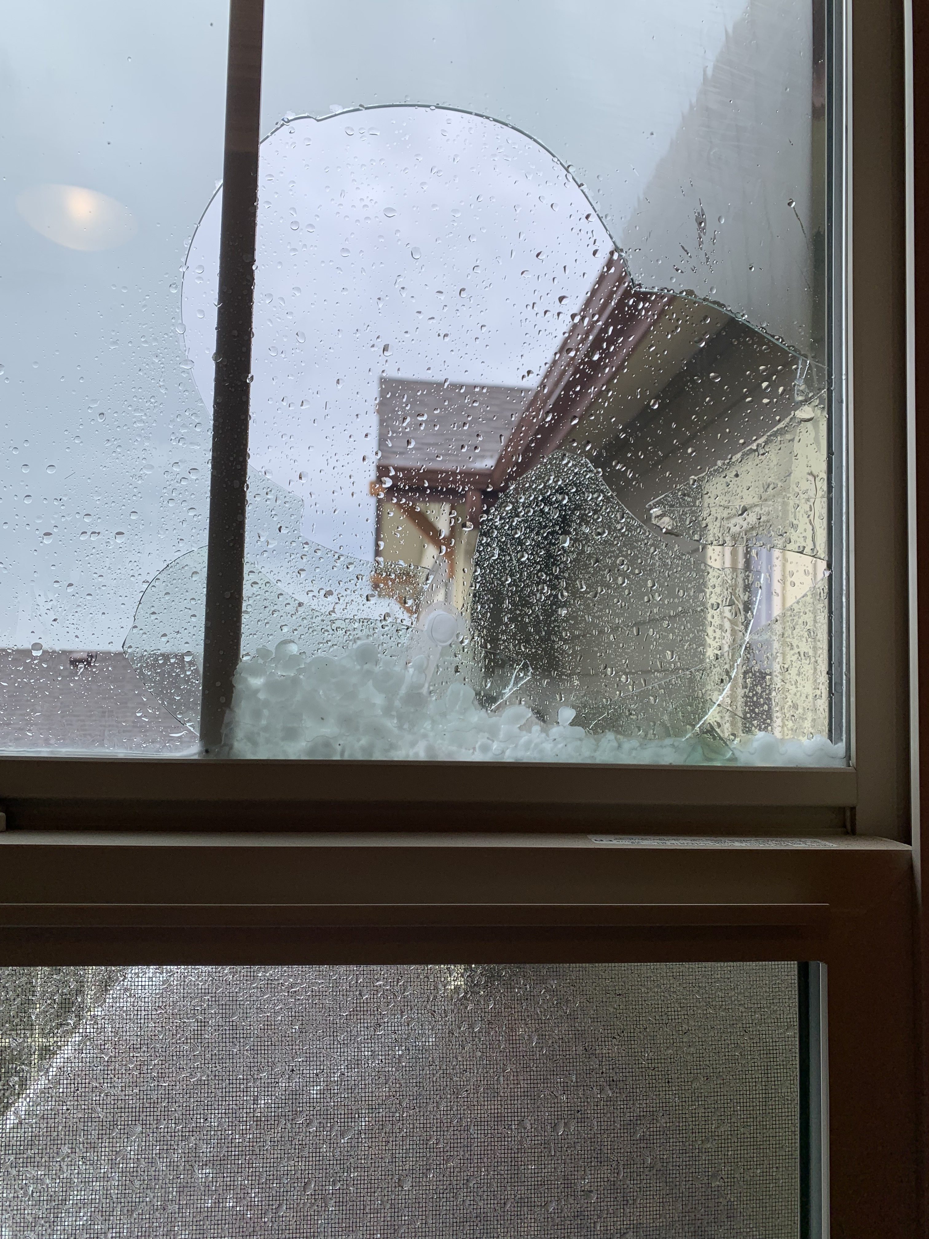 Shattered windows from hail in Castle Rock 2