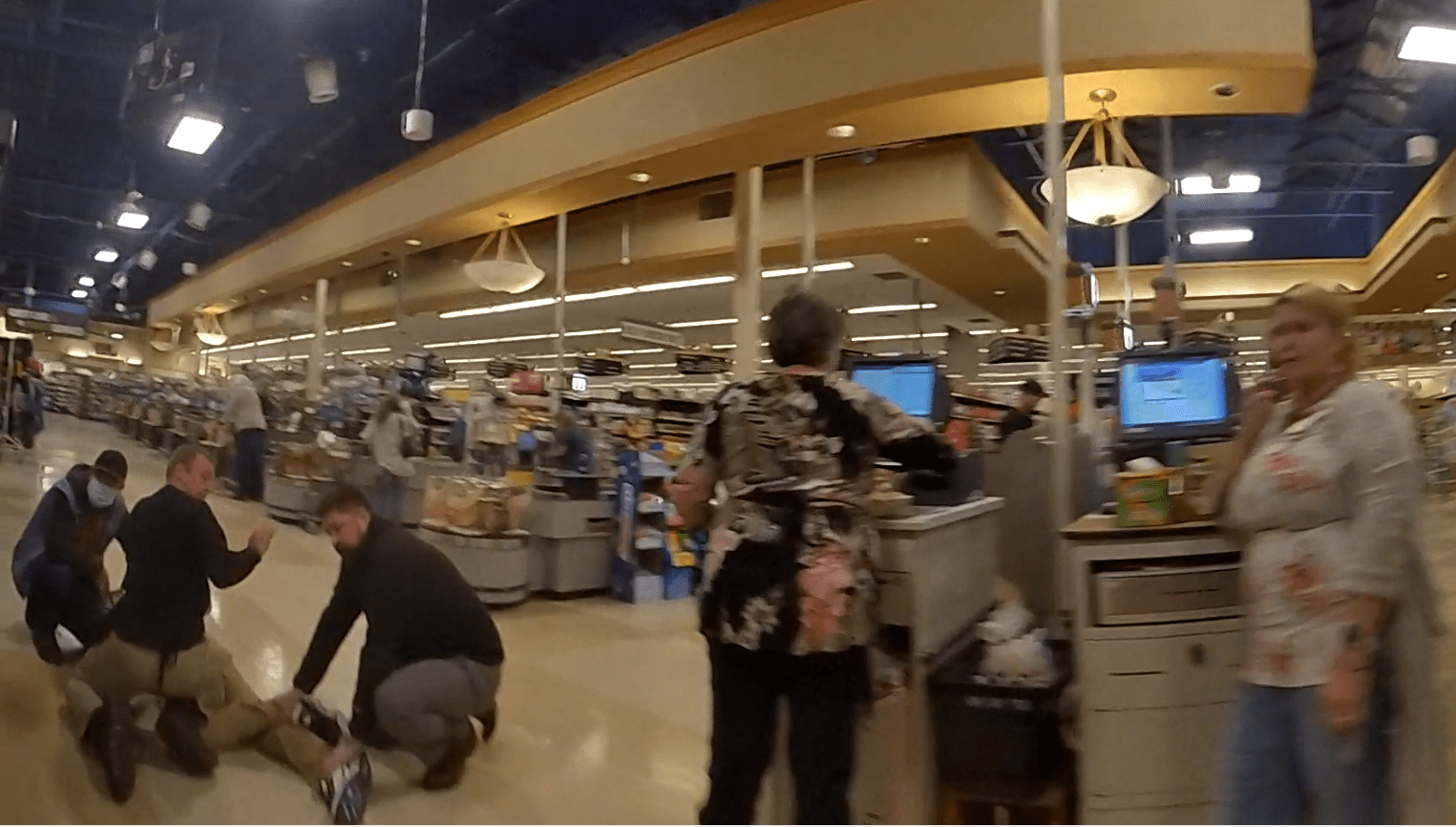 Body camera video showing King Soopers employees holding a shoplifting suspect inside the store