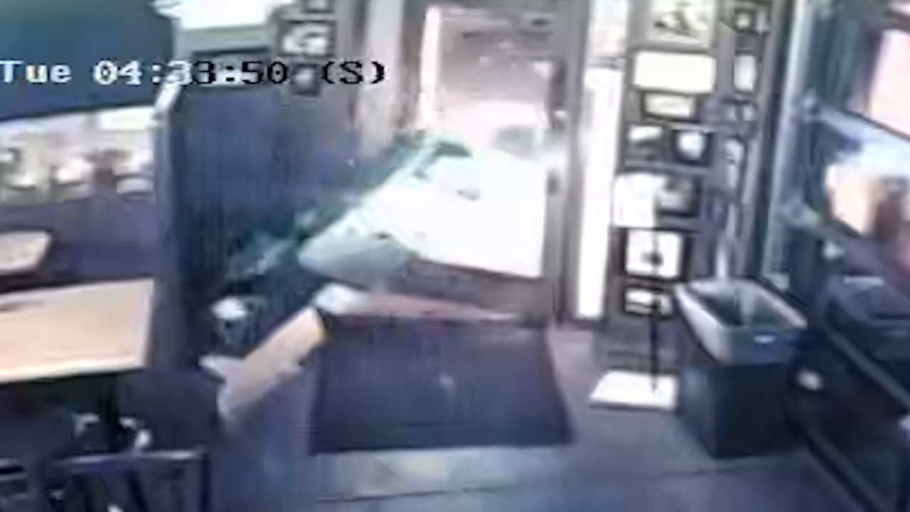 Surveillance video from Spot Bar and Grill shows a truck being used to pull steal an ATM.