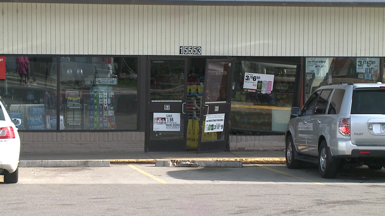 The outside of a convenience store where Aurora Police say a man was found dead from an apparent gunshot wound.